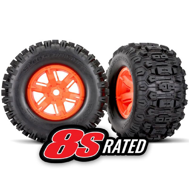 TRAXXAS TIRES & WHEELS ASSMB (X-MAXX ORANGE WHEELS SLEDGEHAMMER TIRES) (L&R) (2)