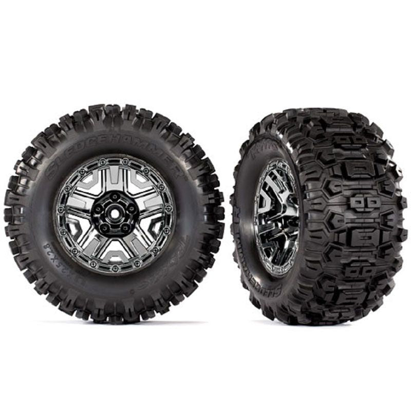 TRAXXAS T&W ASSEM (BLACK CHROME 2.8' WHEELS SLEDGEHAMMER TIRES) (2) (TSM RATED)